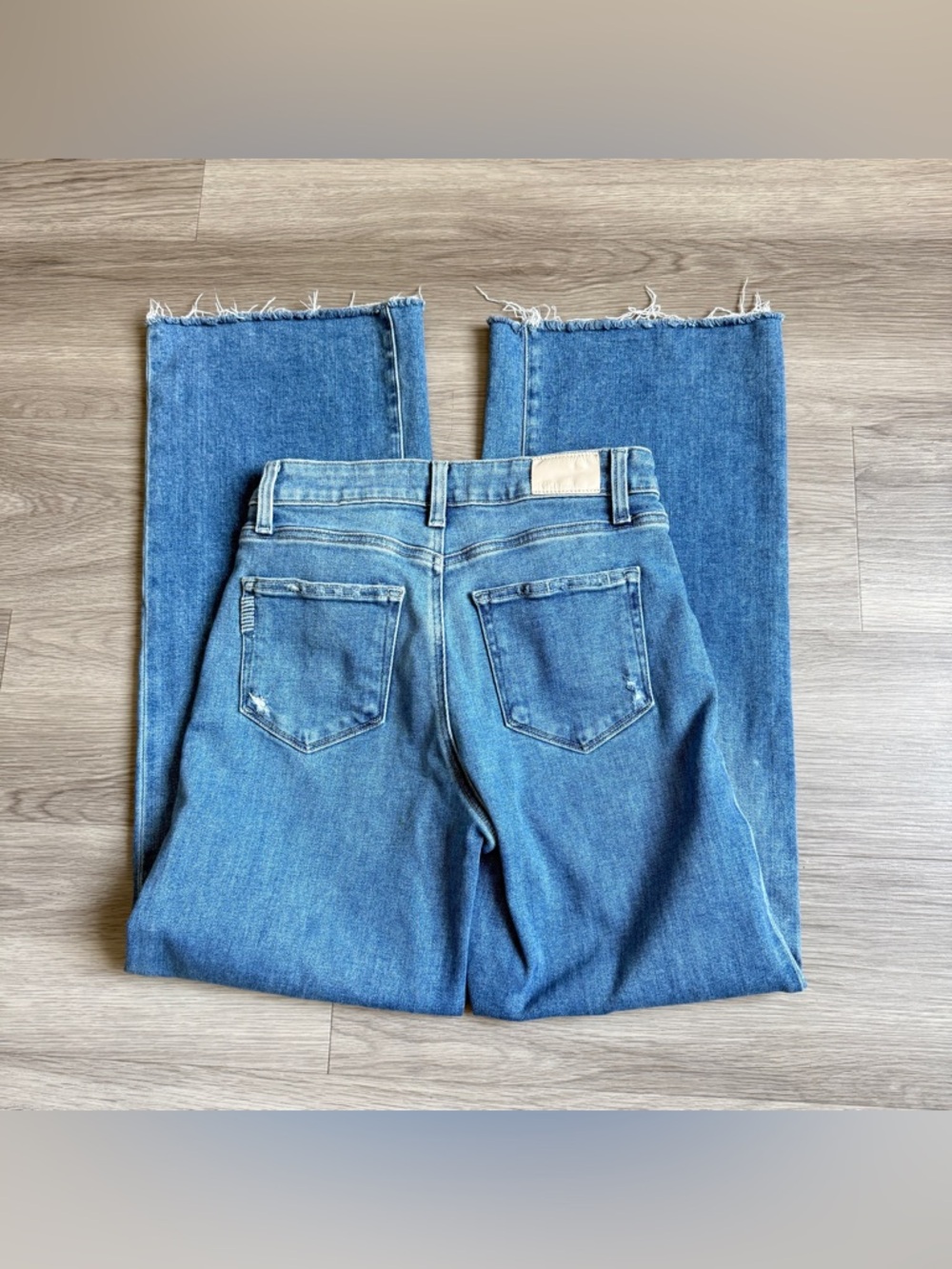 PAIGE Blue Wide Leg Raw Hem Jeans - Picture 5 of 13